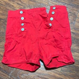 red shorts